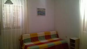 Posteľ alebo postele v izbe v ubytovaní Apartment in Kustici with sea view, terrace, air conditioning, Wi-Fi (4847-3)