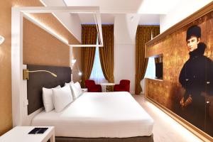 Postel nebo postele na pokoji v ubytování Áurea Ana Palace by Eurostars Hotel Company