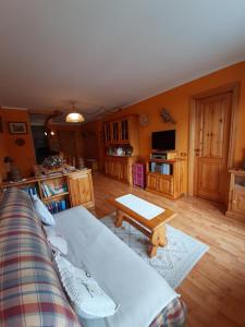 TV a/nebo společenská místnost v ubytování Maison Giada
