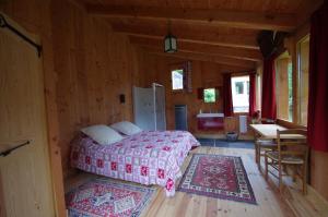 Postel nebo postele na pokoji v ubytování le moulin