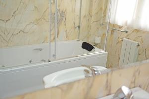 Koupelna v ubytování Hotel Vijanera