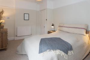 מיטה או מיטות בחדר ב-Richmond Villa