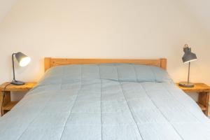 מיטה או מיטות בחדר ב-Richmond Villa