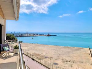 a view of the ocean from the balcony of a house at Cofradia Penthouse in Alcudia