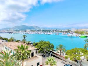 a view of a harbor with boats in the water at Cofradia Penthouse in Alcudia