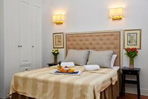Posteľ alebo postele v izbe v ubytovaní Casa Dei Fiori