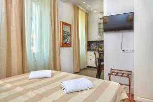Posteľ alebo postele v izbe v ubytovaní Casa Dei Fiori