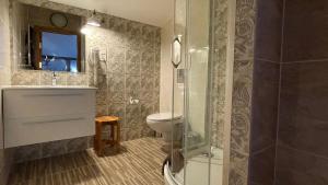 Koupelna v ubytování Hotel Vilhelmine + 37 fotografií