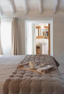 Postel nebo postele na pokoji v ubytování Hacienda Fresneda María by Charming Stay Adults Recommended