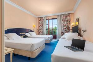 Krevet ili kreveti u jedinici u okviru objekta Hospedium Hotel Blu Sondika