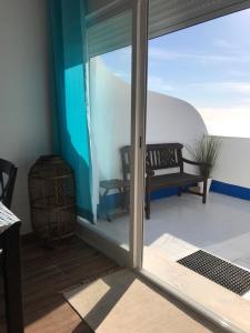 En balkon eller terrasse på Casa Praia do Sul