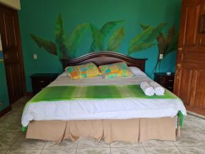 מיטה או מיטות בחדר ב-Villas Valle Bello