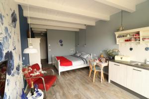 Postel nebo postele na pokoji v ubytování B&B Buutegeweun