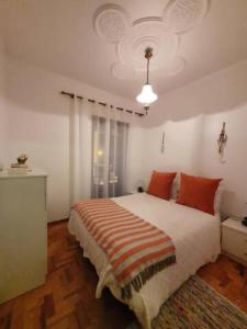 Ένα ή περισσότερα κρεβάτια σε δωμάτιο στο A Casa dos Avós