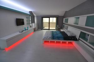 Postel nebo postele na pokoji v ubytování Dekar Apartments