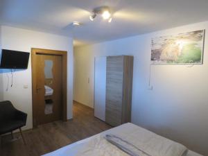 Postel nebo postele na pokoji v ubytování Alpenhaus Denver