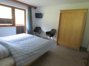 Postel nebo postele na pokoji v ubytování Alpenhaus Denver