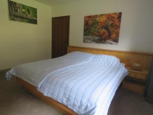 Postel nebo postele na pokoji v ubytování Alpenhaus Denver