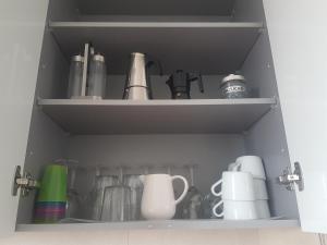 Príslušenstvo na prípravu kávy alebo čaju v ubytovaní Apartamento Gloria 1 Parking privado gratis