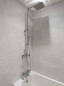a bathroom with a shower and a sink at Fairway View Cottage in Rothbury +38 photos