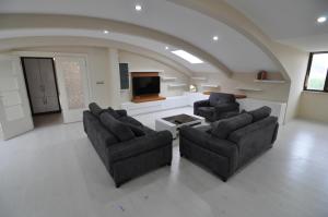 Posezení v ubytování Dekar Apartments