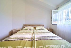 Postel nebo postele na pokoji v ubytování Apartment in Soline - Insel Krk 38395