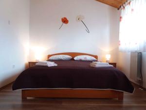 a bedroom with a bed with two towels on it at Apartment in Rovinj/Istrien 11560 in Štanga