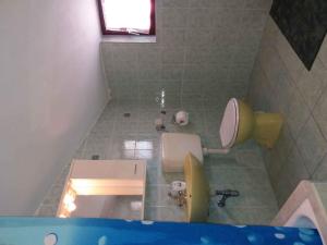 a bathroom with a sink and a toilet and a tub at Apartment in Rovinj/Istrien 11560 in Štanga