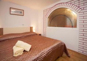 Posteľ alebo postele v izbe v ubytovaní Apartment in Rovinj - Istrien 11608