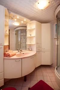 a bathroom with a sink and a mirror at Apartment in Rovinj/Istrien 11608 in Štanga