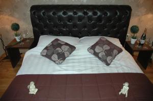 Postel nebo postele na pokoji v ubytování Guest House Maja