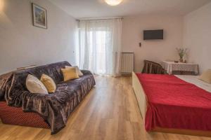 Posteľ alebo postele v izbe v ubytovaní Apartment Vrbnik 21