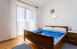 Postel nebo postele na pokoji v ubytování Apartment in Silo - Insel Krk 13498