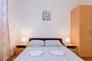 Posteľ alebo postele v izbe v ubytovaní Apartment in Crikvenica 5267