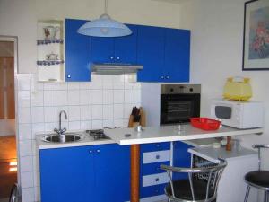 Kuchyň nebo kuchyňský kout v ubytování Apartment Supetarska Draga 26 + 8 fotografií