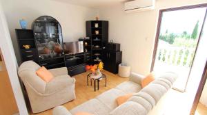 Posezení v ubytování Apartment in Malinska 12