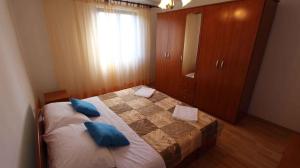 Postel nebo postele na pokoji v ubytování Apartment in Malinska 12