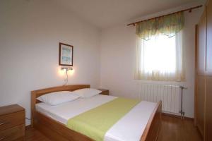 Postel nebo postele na pokoji v ubytování Apartment in Malinska/Insel Krk 12860
