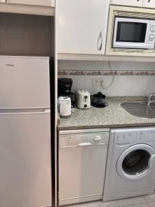 A kitchen or kitchenette at Céntrico, Gran Vía Sol Plaza Mayor