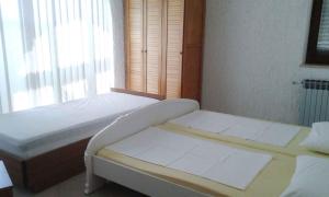 Posteľ alebo postele v izbe v ubytovaní Apartment Sv. Juraj 5