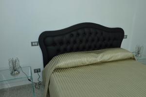 Postel nebo postele na pokoji v ubytování B&B Relais Paradise