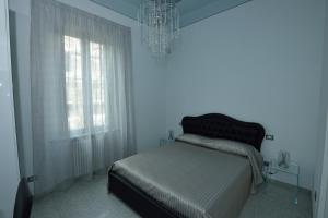 Postel nebo postele na pokoji v ubytování B&B Relais Paradise
