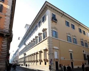 a large building on the side of a street at Residenza Ruspoli Bonaparte in Rome