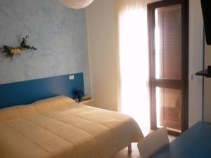 Posteľ alebo postele v izbe v ubytovaní Villa Al Mare Guest House