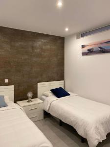 Postel nebo postele na pokoji v ubytování Sonneland Canary Spa