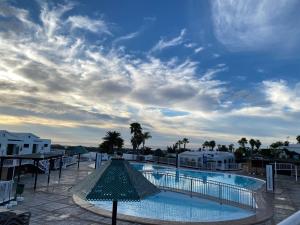 a view of a swimming pool on a resort at Sonneland Canary Spa in San Bartolomé