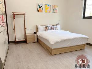 Postel nebo postele na pokoji v ubytování Art Ocean B&B