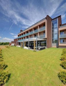 a large yard in front of a building at Hotel Kaj in Marija Bistrica