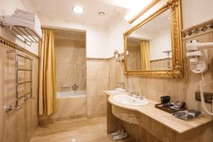 Ванная комната в Axelhof Бутик-отель