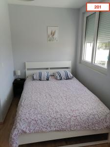 Postel nebo postele na pokoji v ubytování Immoappart